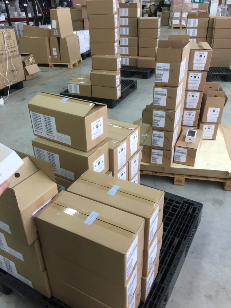 Boxed electronic accessories in storage